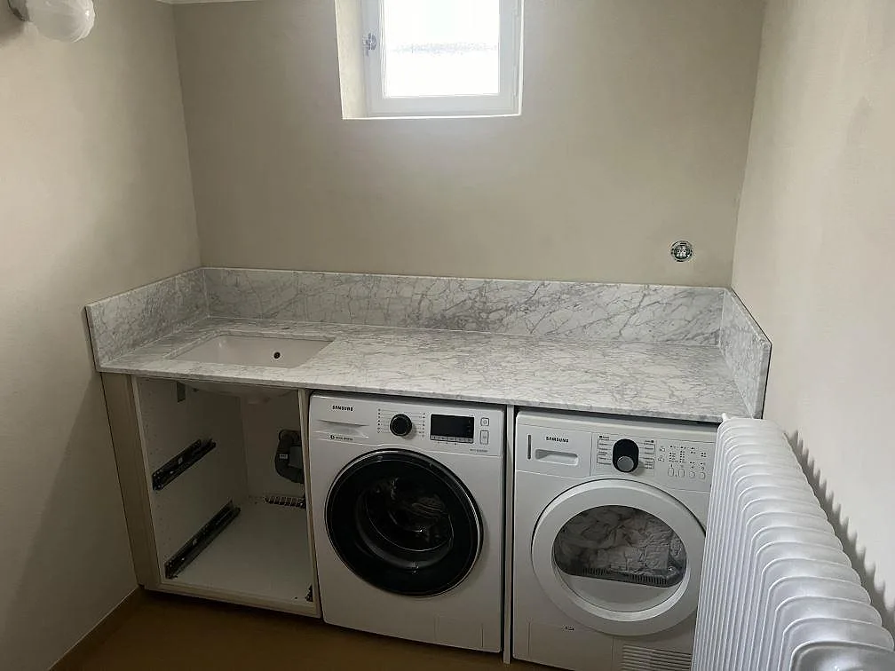 Gennemført projekt: Bordplade i Carrara C, Enskede.