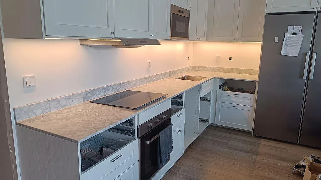 Gennemført projekt: Køkkenbordplade i Carrara C, Malmö.