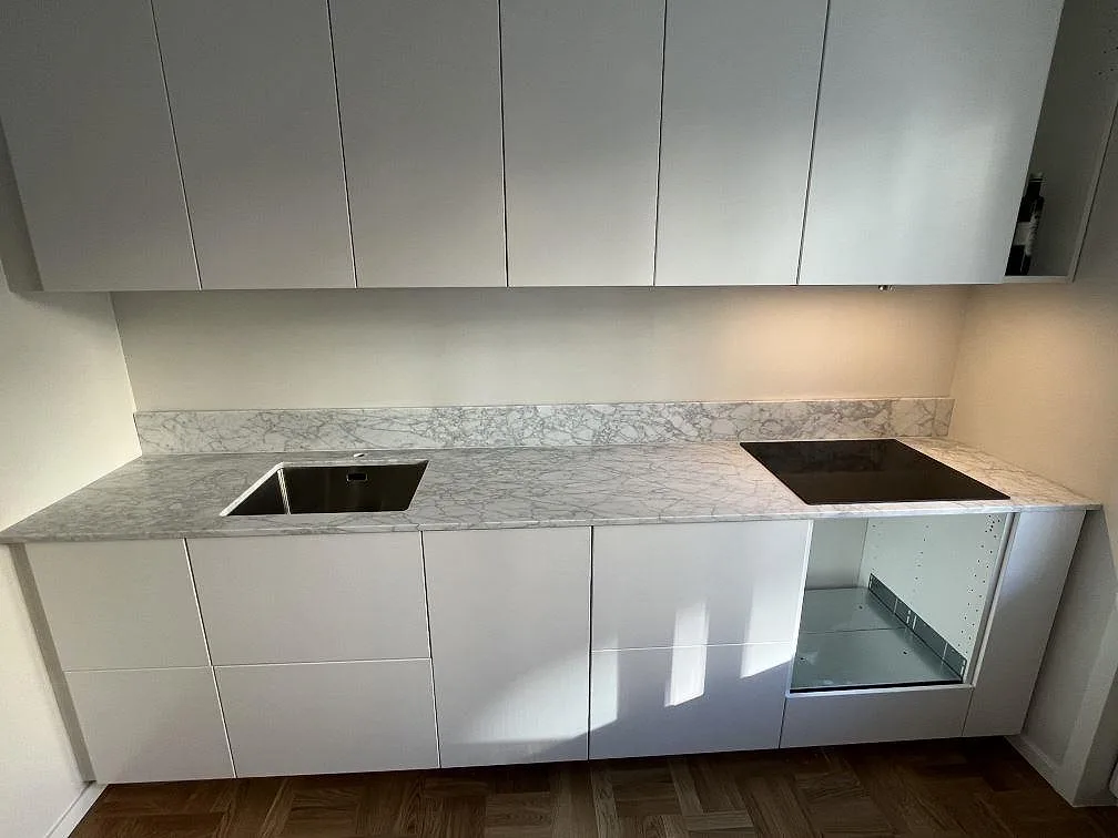 Gennemført projekt: Køkkenbordplade i Carrara C, Solna.