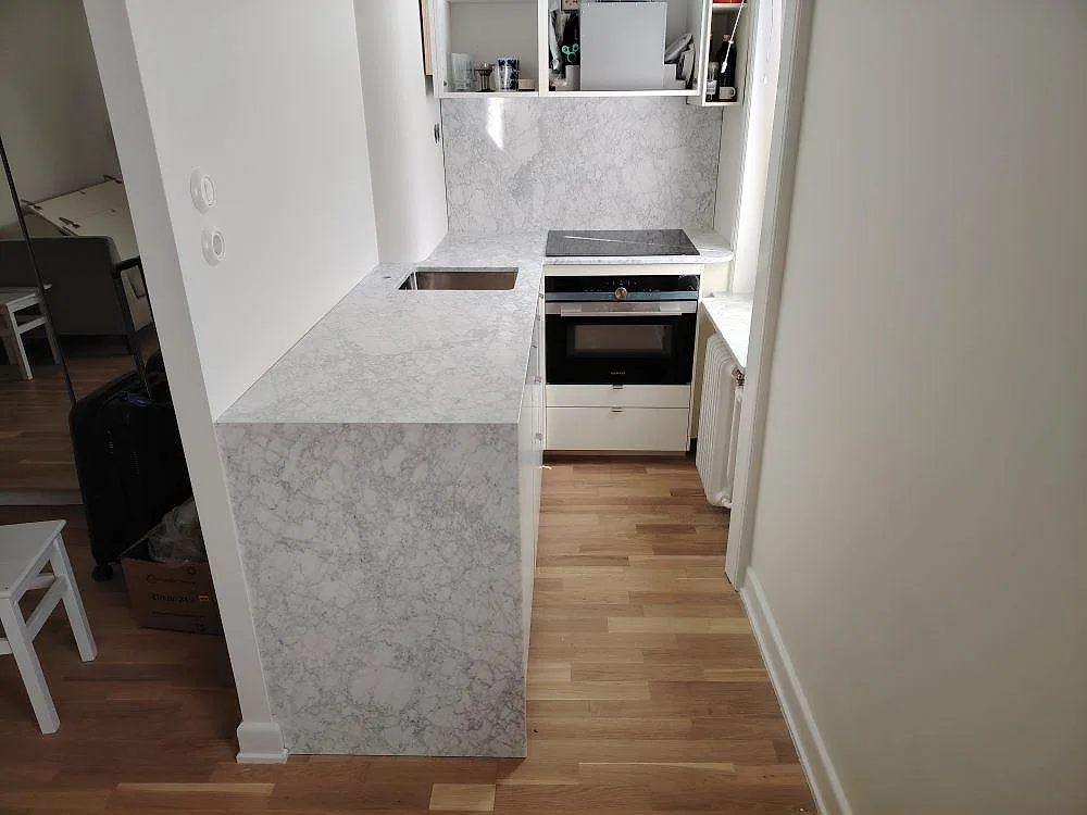 Gennemført projekt: Køkkenbordplade i Carrara C, Stockholm.