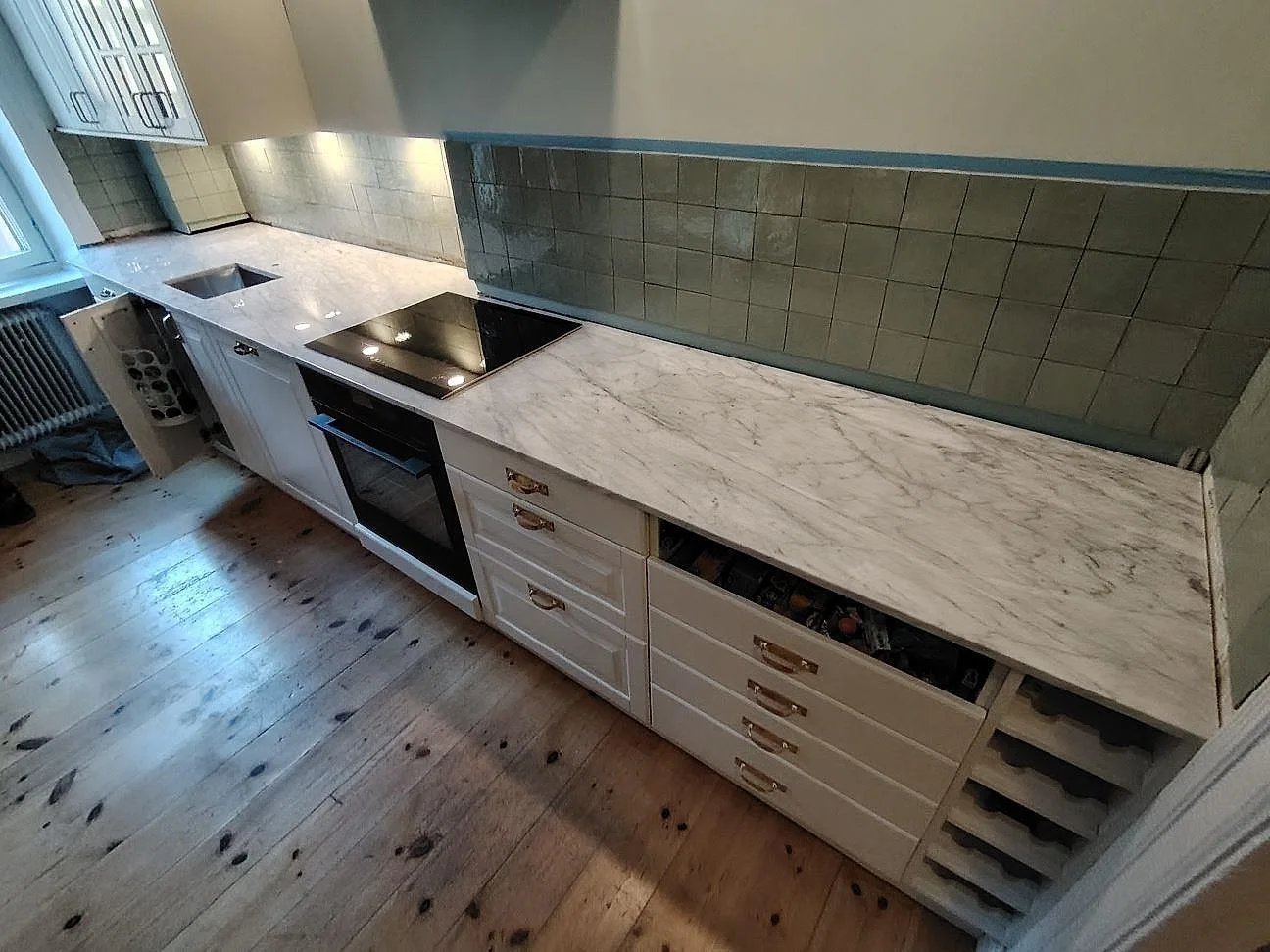 Gennemført projekt: Køkkenbordplade i Carrara C, Stockholm.