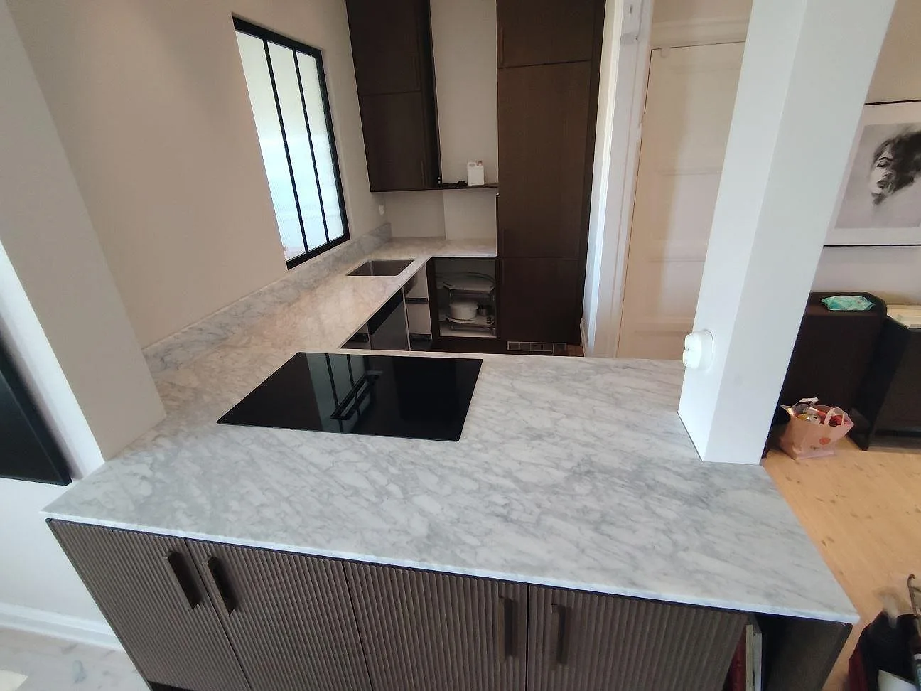 Gennemført projekt: Køkkenbordplade i Carrara C, Stockholm.