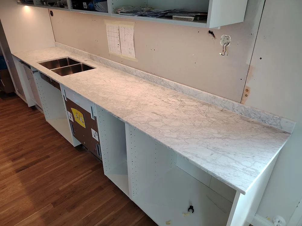 Gennemført projekt: Køkkenbordplade i Carrara C, Saltsjö Boo.