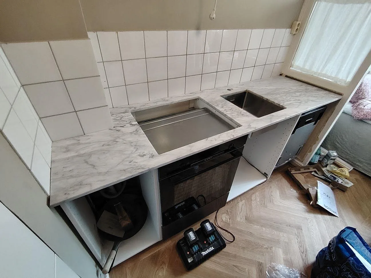 Gennemført projekt: Køkkenbordplade i Carrara C, Stockholm.