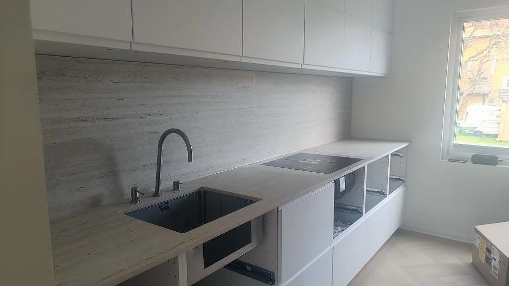 Gennemført projekt: Køkkenbordplade i Dekton Marmorio, Halmstad.