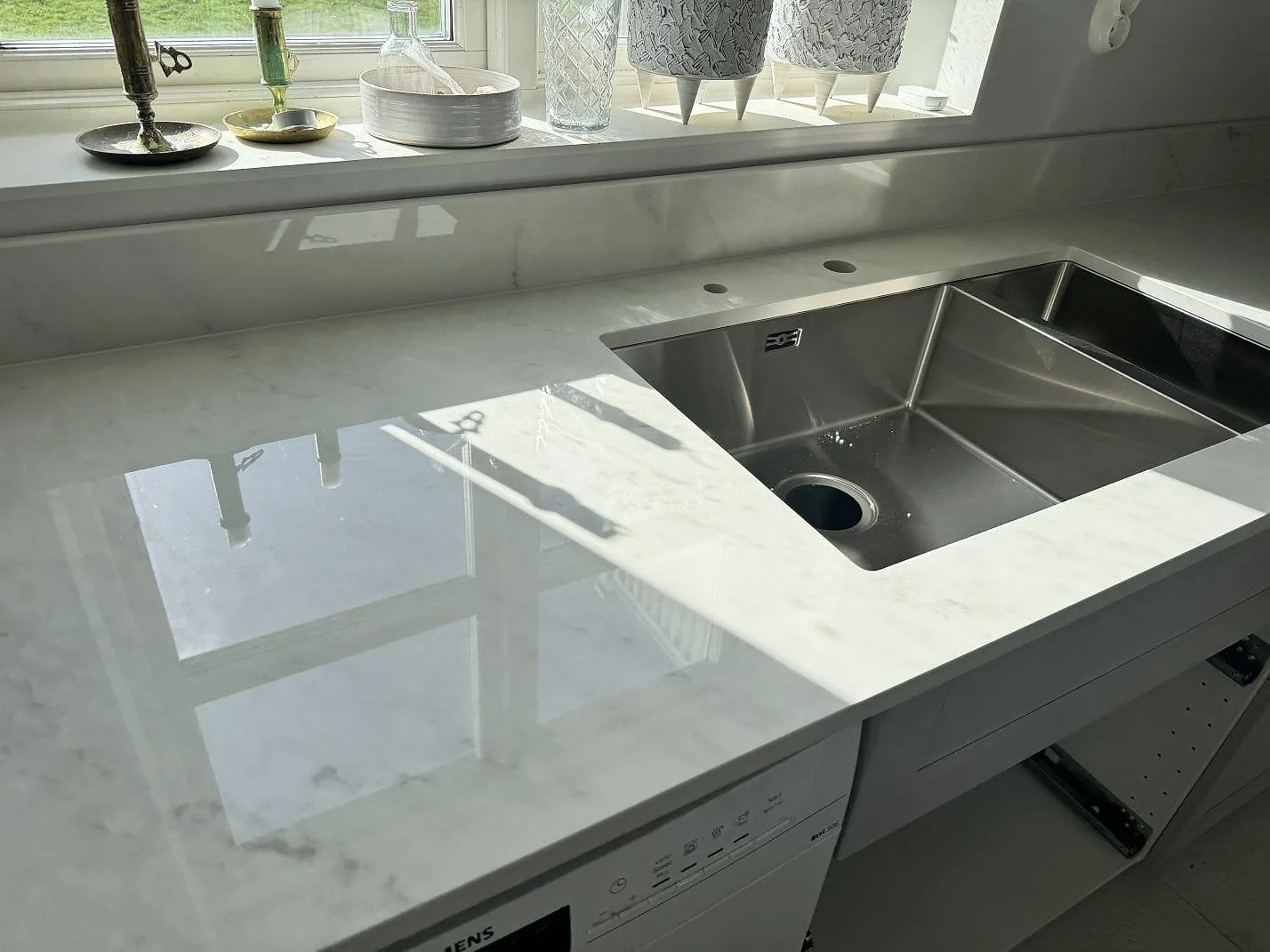 Gennemført projekt: Køkkenbordplade i Dekton Salina, Sävedalen.