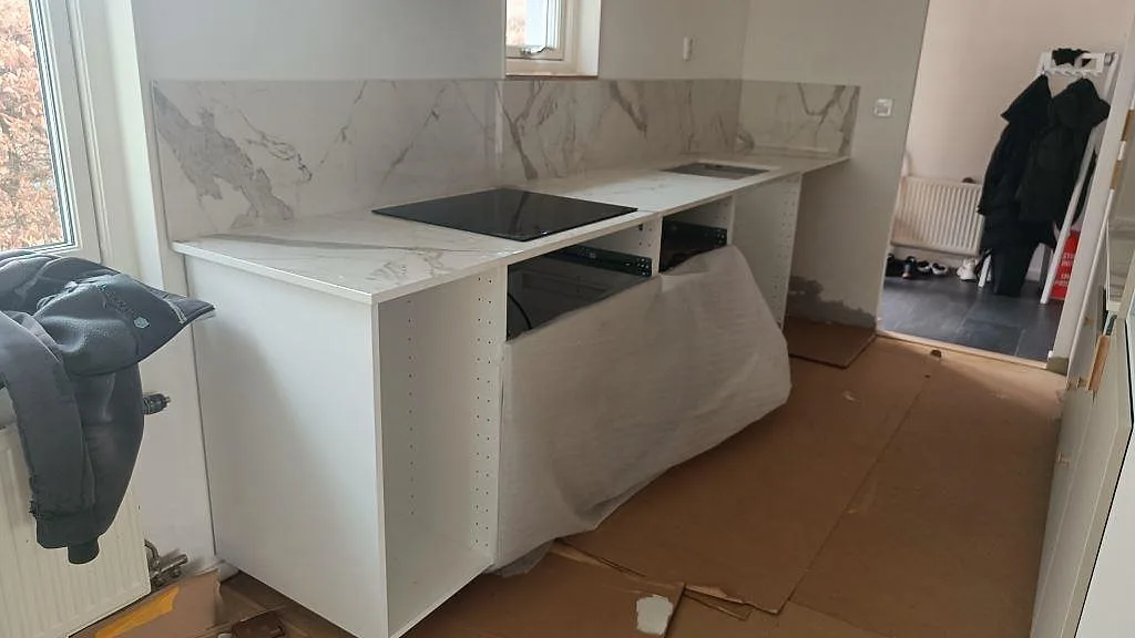 Gennemført projekt: Køkkenbordplade i Dekton Vigil, Smygehamn.