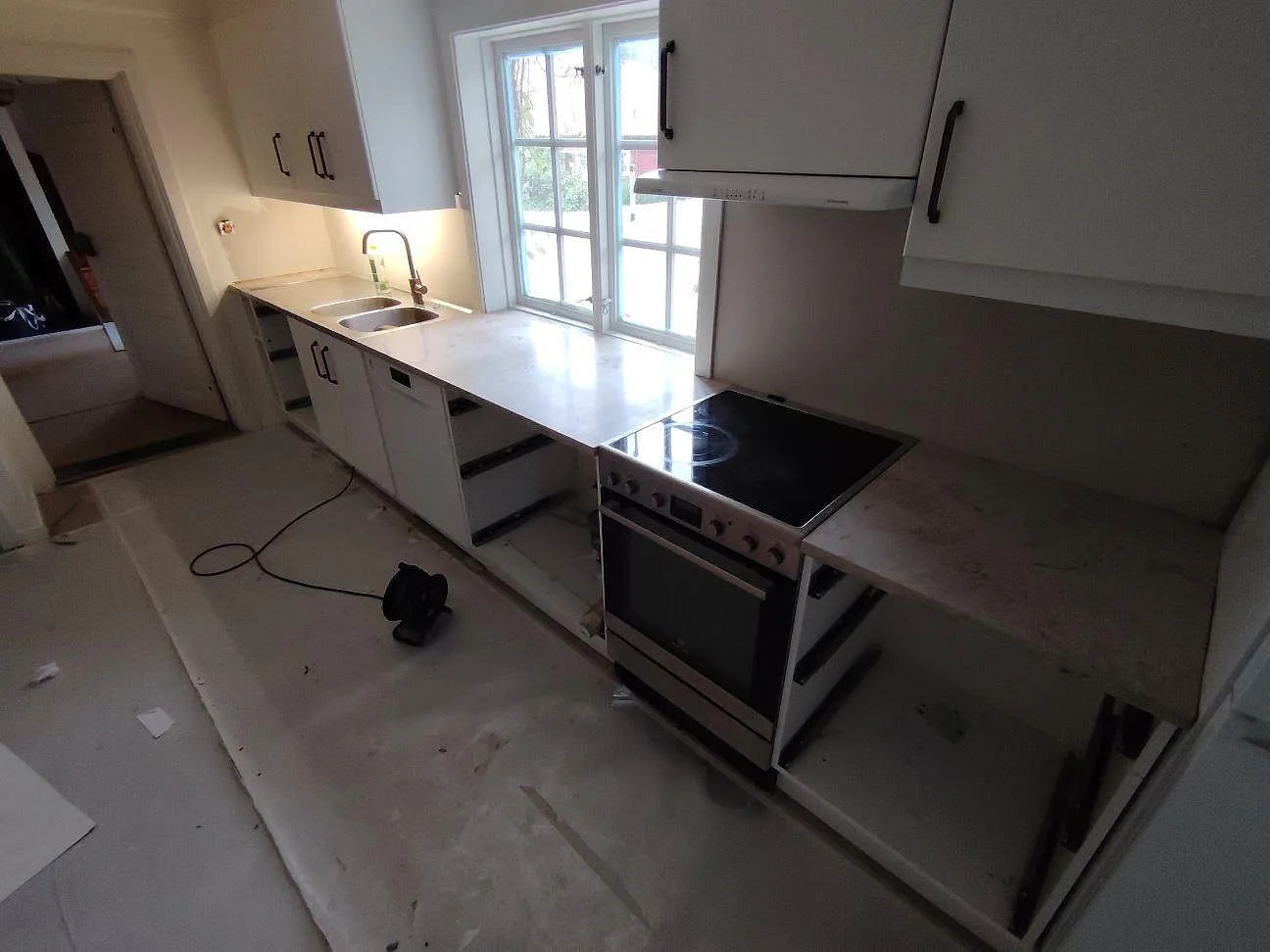 Gennemført projekt: Køkkenbordplade i Jura Grey, Mariefred.