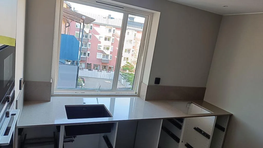 Gennemført projekt: Køkkenbordplade i Silestone Coral Clay, Karlskrona.