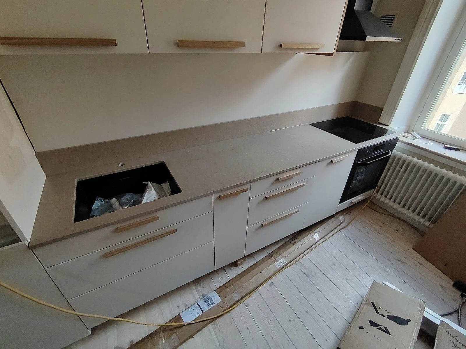 Gennemført projekt: Køkkenbordplade i Silestone Coral Clay, Stockholm.