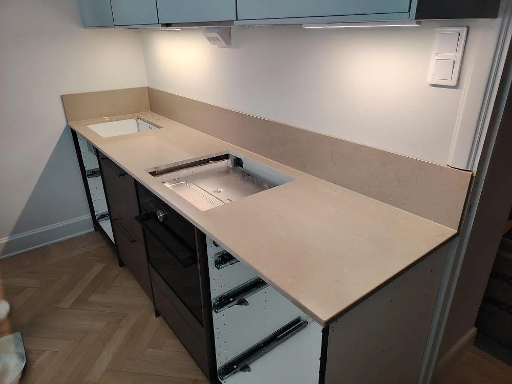 Gennemført projekt: Køkkenbordplade i Silestone Coral Clay, Stockholm.