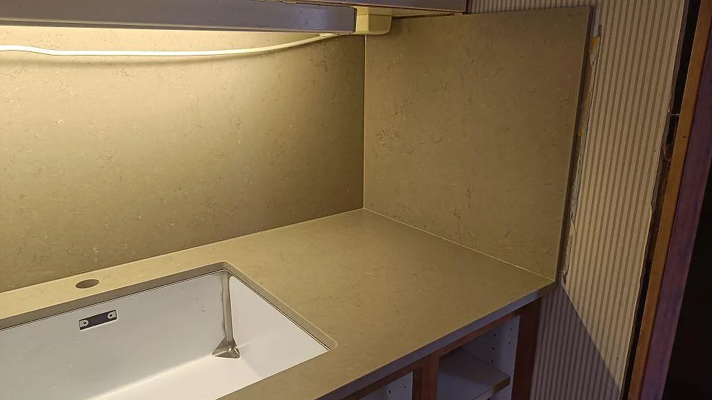 Gennemført projekt: Køkkenbordplade i Silestone Coral Clay, Ystad.