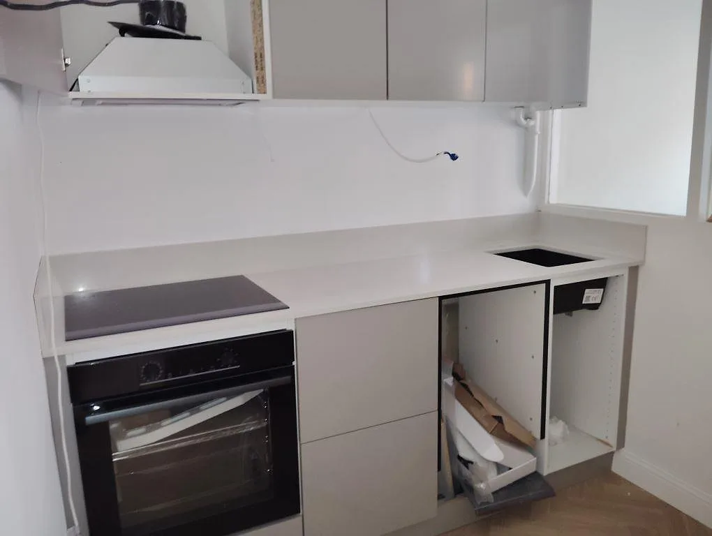 Gennemført projekt: Køkkenbordplade i Silestone Desert Silver, Stockholm.