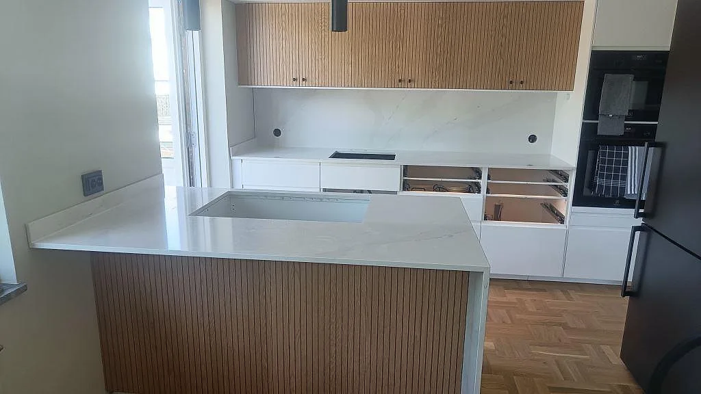 Gennemført projekt: Køkkenbordplade i Silestone Eternal Calacatta Gold, Limhamn.
