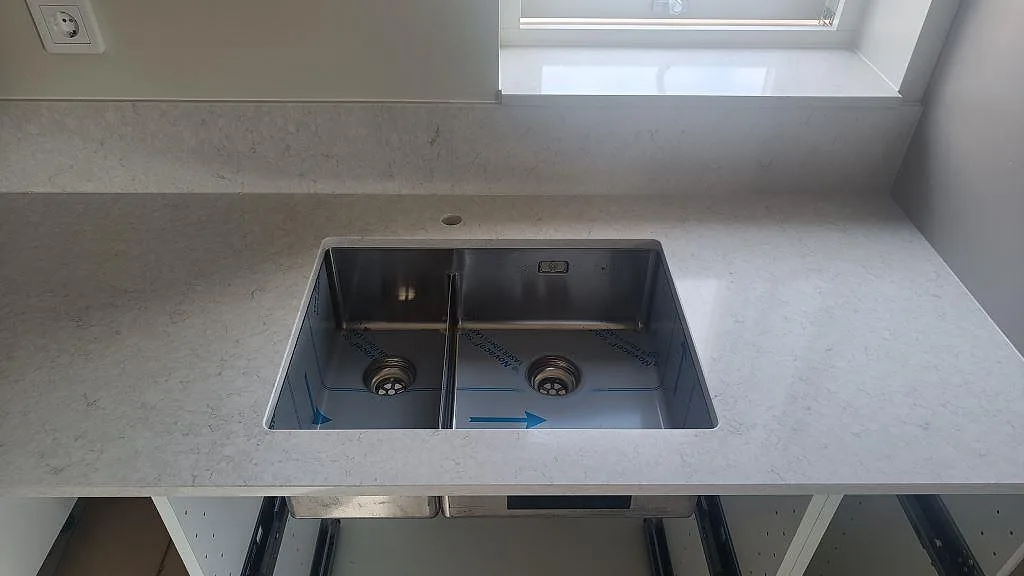 Gennemført projekt: Køkkenbordplade i Silestone Snowy Ibiza, Falkenberg.