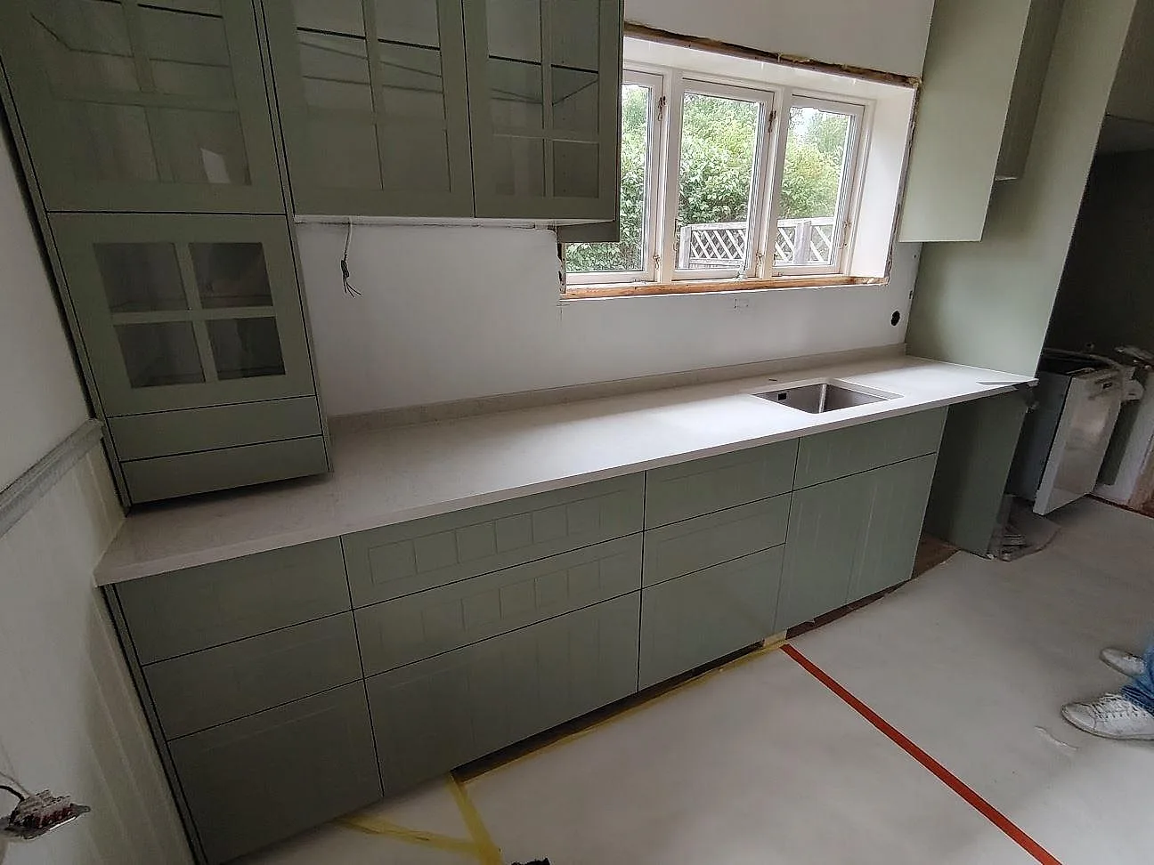 Gennemført projekt: Køkkenbordplade i Silestone Snowy Ibiza, Ljusterö.