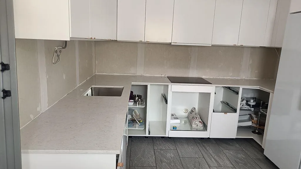 Gennemført projekt: Køkkenbordplade i Silestone Snowy Ibiza, Svedala.