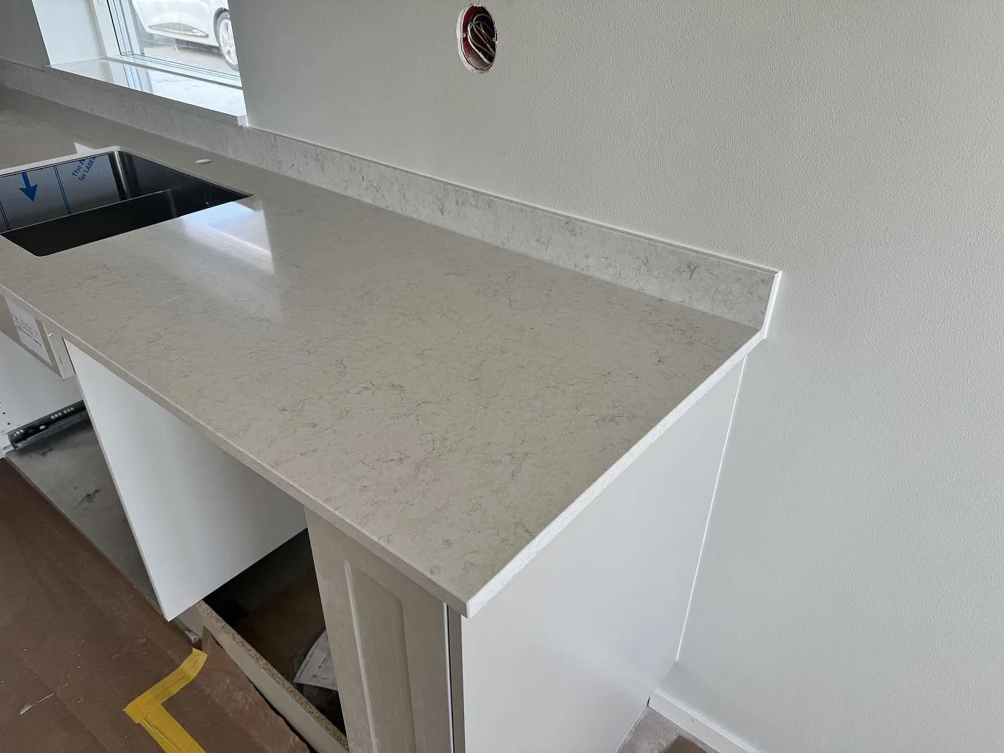 Gennemført projekt: Køkkenbordplade i Silestone Snowy Ibiza, Varberg.