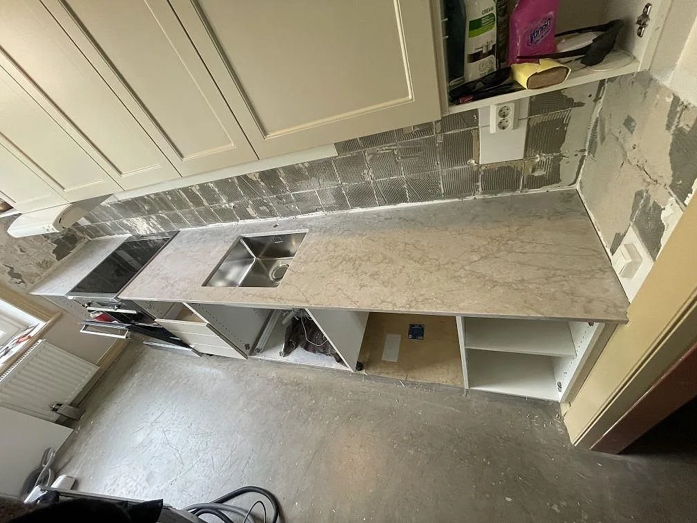 Gennemført projekt: Køkkenbordplade i Technistone Glencoe, Stockholm.