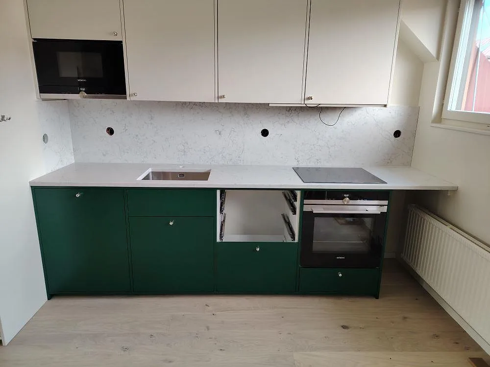 Gennemført projekt: Køkkenbordplade i Technistone Mystery White, Stockholm.