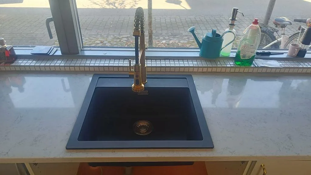 Gennemført projekt: Køkkenbordplade i Technistone Noble Carrara, Lund.